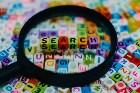 search via magnifying glass